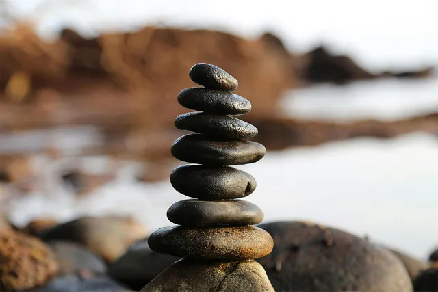 Pile of stones by a lake
